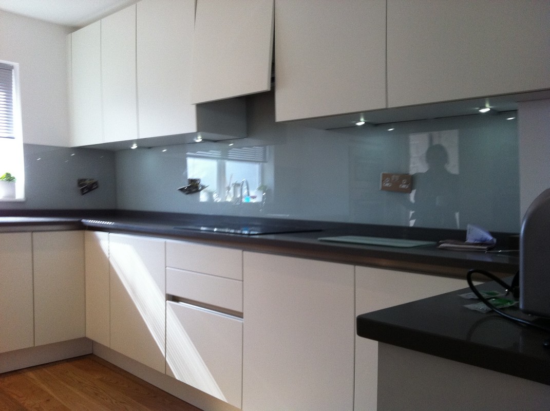 Grey glass kitchen splashback with LED lighting in Earlsfield