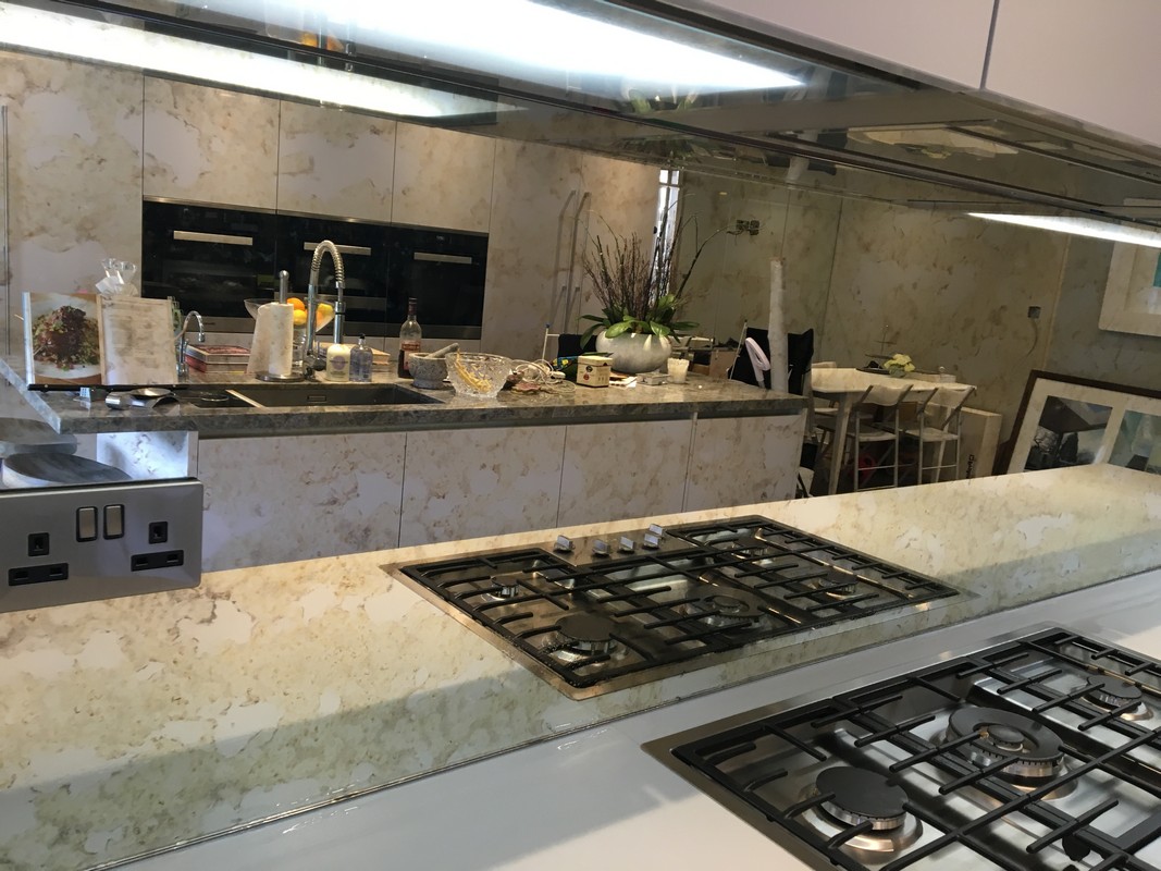 Mirror glass splashback in Earlsfield luxury kitchen
